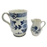 18th century blue and white bell-shaped mug decorated in the rock and peony pattern