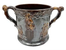 Large 19th century Staffordshire treacle glazed frog loving cup