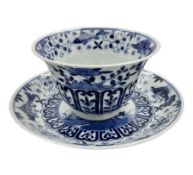 18th century Chinese blue and white Kangxi tea bowl and saucer decorated with rockwork and peonies w