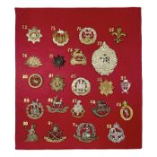 Twenty-two glengarry and cap badges including Argyll & Sutherland