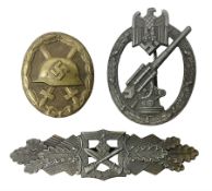 Three WW2 German badges - Close Combat Clasp; Army Flak badge; and Wound badge