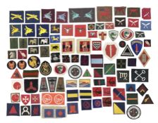 Approximately one-hundred printed and embroidered cloth badges including 3rd Indian Infantry
