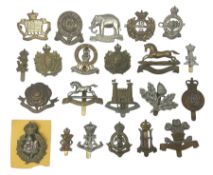 Twenty-two Hussars metal cap badges including South Notts