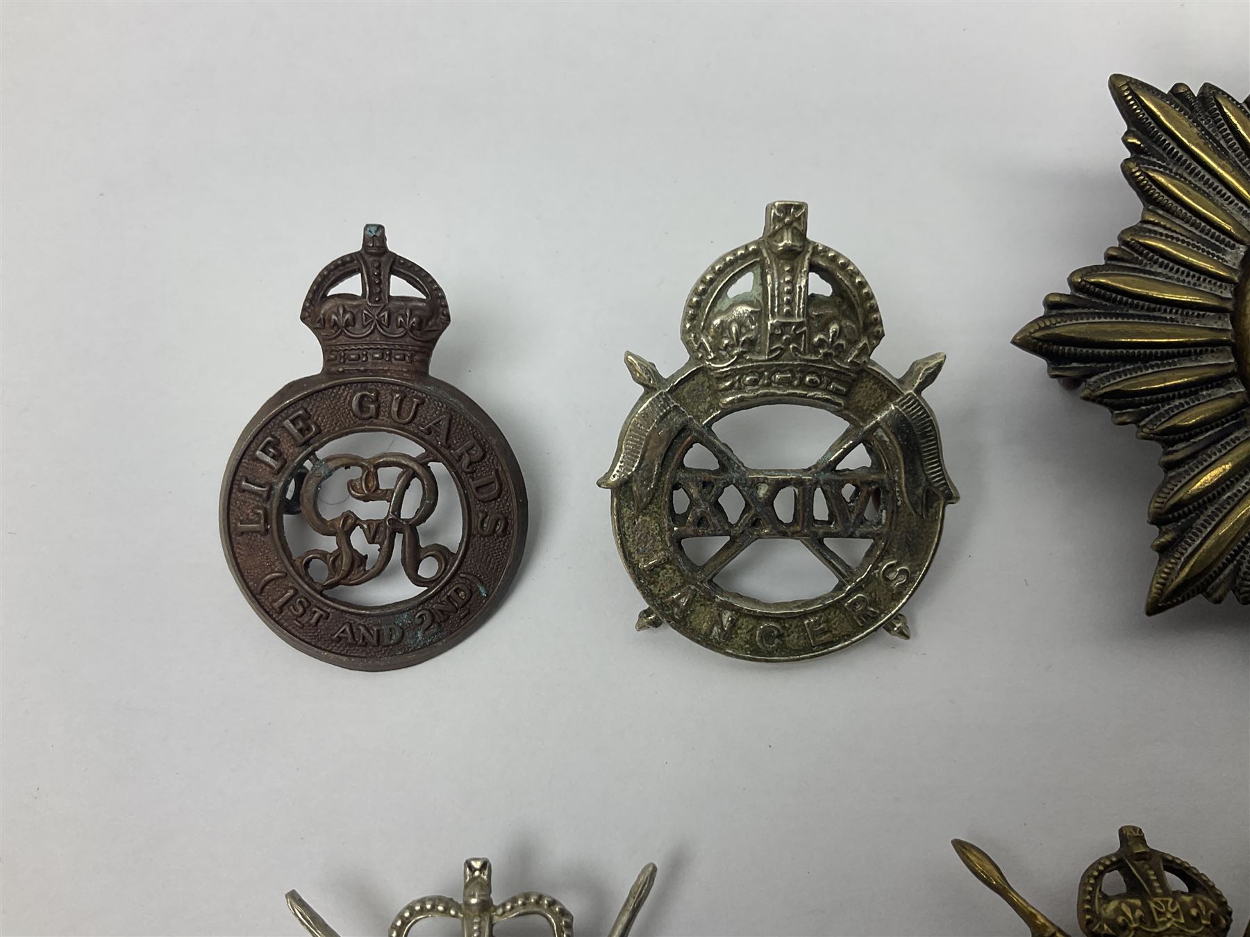 Nine Lancers metal cap badges including 9th - Image 2 of 17