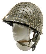 WW2 American MKI steel helmet with liner; green painted with camo net