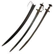 Late 19th/early 20th century Indian Tulwar sword with 81cm plain curving steel blade and iron hilt w