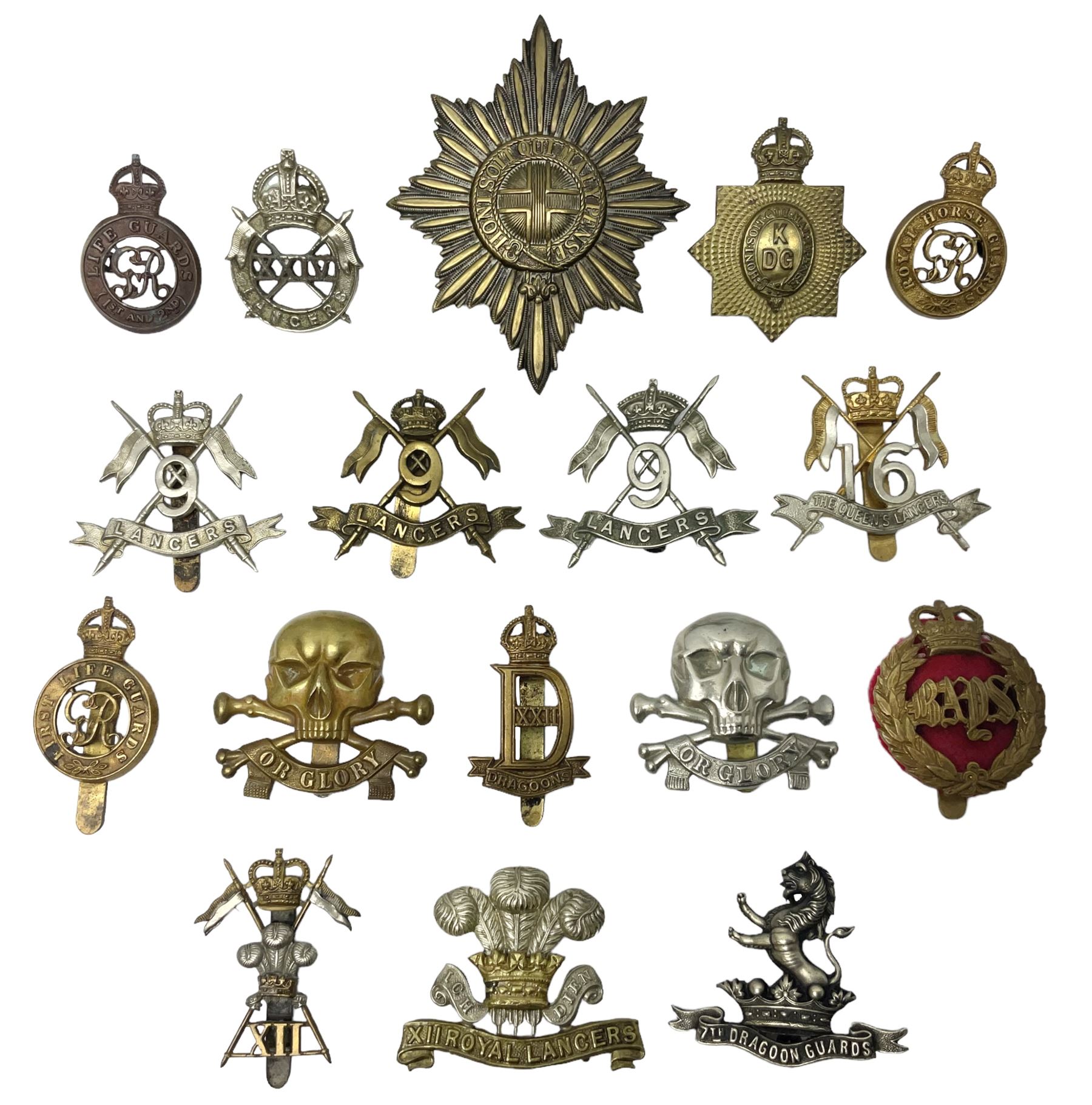 Nine Lancers metal cap badges including 9th