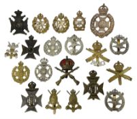 Twenty various cap badges including Rifle Brigade