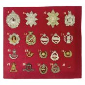 Eighteen glengarry and cap badges including Argyll & Sutherland
