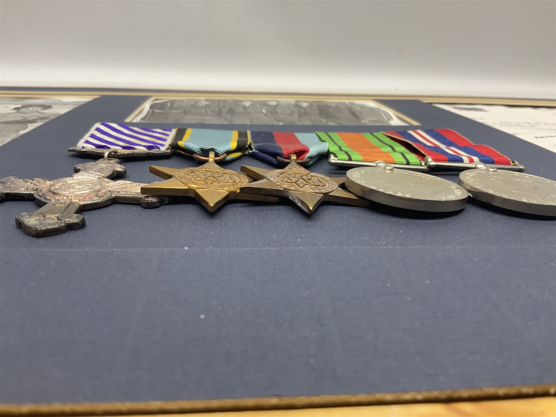 Warrant Officer Gordon Pearce D.F.C. R.A.F.V.R. - display of five medals comprising copy Distinguish - Image 7 of 9