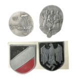 Two WW2 German 'tinnie' badges - Labour Day 1935 by Overhoff & Cie Ludenscheid & Labour Day 1936 by