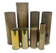 Eight WW1/WW2 and post-WW2 plain brass shell cases