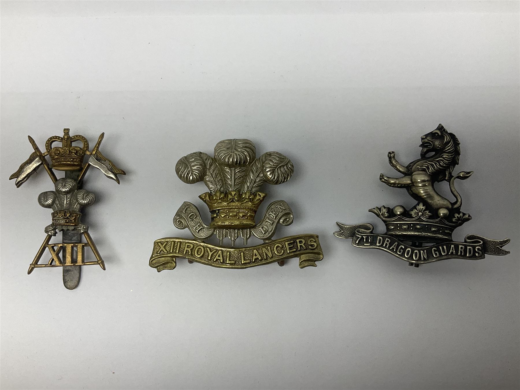 Nine Lancers metal cap badges including 9th - Image 16 of 17
