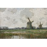 Kershaw Schofield (British 1872-1941): Dutch Landscape with Windmills beyond a Reedy Pond