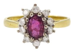 18ct gold oval ruby and round brilliant cut diamond cluster ring