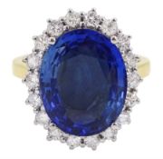 18ct gold oval unheated sapphire and round brilliant cut diamond cluster ring