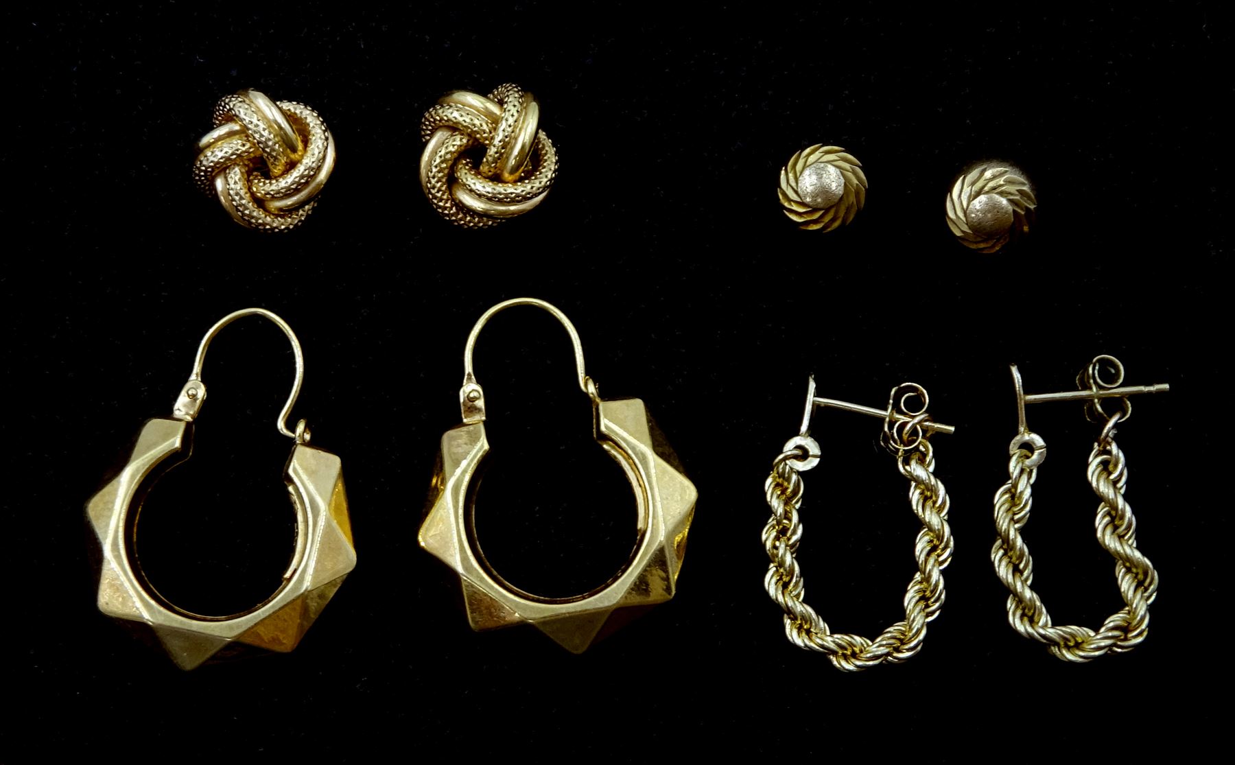 Four pairs of 9ct gold earrings including knot studs and geometric hoops