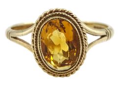 9ct gold oval citrine ring with rope twist surround