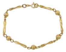 9ct gold bead and bar link bracelet