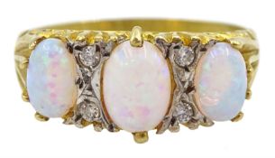 Silver-gilt three stone opal and cubic zirconia ring