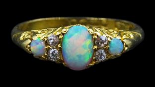 Edwardian 18ct gold three stone opal ring