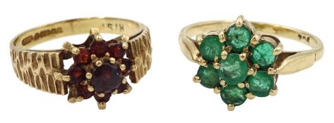 Gold garnet cluster ring with bark effect shoulders and a gold emerald flower head cluster ring