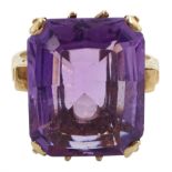 Gold single stone radiant cut amethyst ring