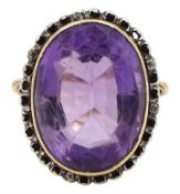 Early 20th century gold single stone oval amethyst ring