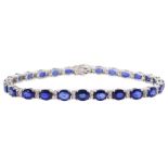 18ct white gold oval sapphire and round brilliant cut diamond bracelet