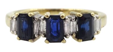 9ct gold three stone emerald cut sapphire ring