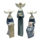 Three Lladro figures of nuns