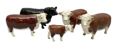 Five Beswick cows