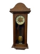 German - early 20th century 8-day spring driven oak cased wall clock