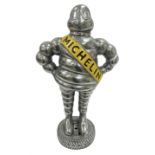 Polished aluminium Michelin man style figure