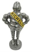 Polished aluminium Michelin man style figure