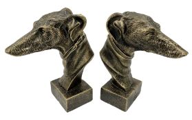 Pair of bronzed cast iron greyhound busts on plinths