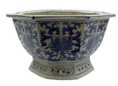 Early 20th century Chinese blue and white footed planter of octagonal form with stylised floral deco