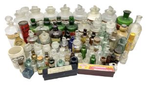 Collection of assorted pharmaceutical and chemist bottles to include green glass examples