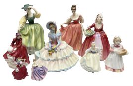 Nine Royal Doulton figures