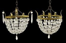 Pair of gilt metal bag chandeliers with faceted glass drops