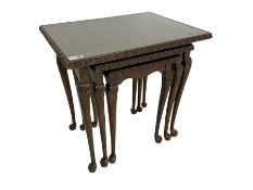 Early to mid-20th century nest of three walnut tables