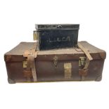 Early 20th century two-handled leather-mounted travelling trunk of large proportions and with re-enf