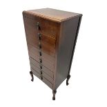 Early 20th century mahogany music cabinet fitted with eight fall front drawers with art deco design