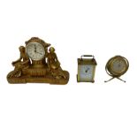 Two quartz battery operated clocks and a Smiths spring wound globe clock.