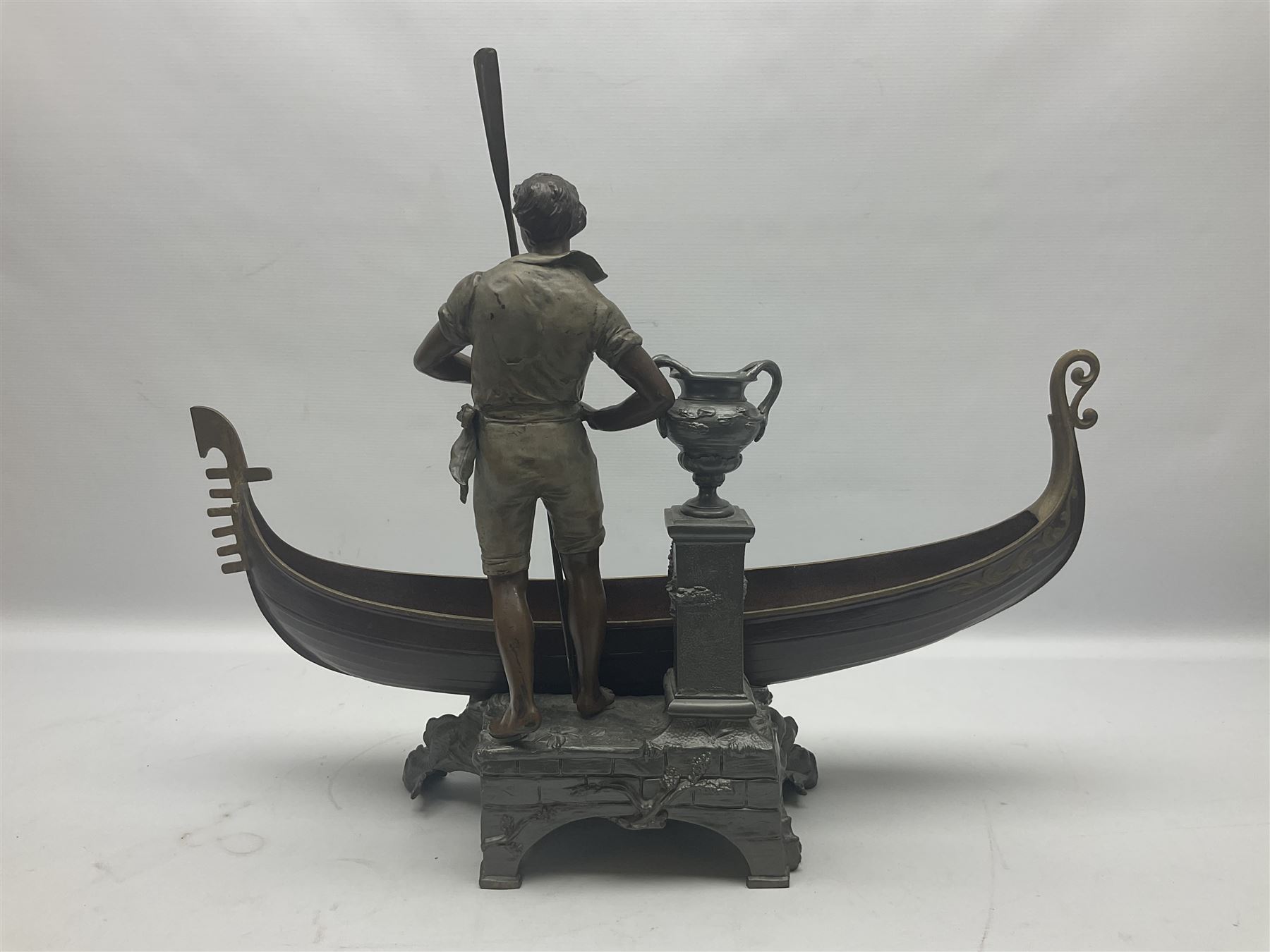 Bronzed and pewter figure group depicting a gentleman stood holding an oar behind his long boat besi - Image 2 of 16