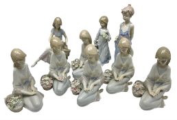 Nine Lladro figures