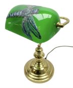 Brass bankers style table lamp with green glass shade and leaded dragonfly decoration