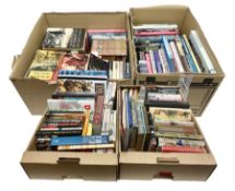 Large collection of hardback and paperback books