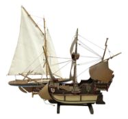 Wooden model of a schooner together with another similar example