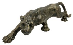 Cast metal figure modelled as a cougar in crouching pose